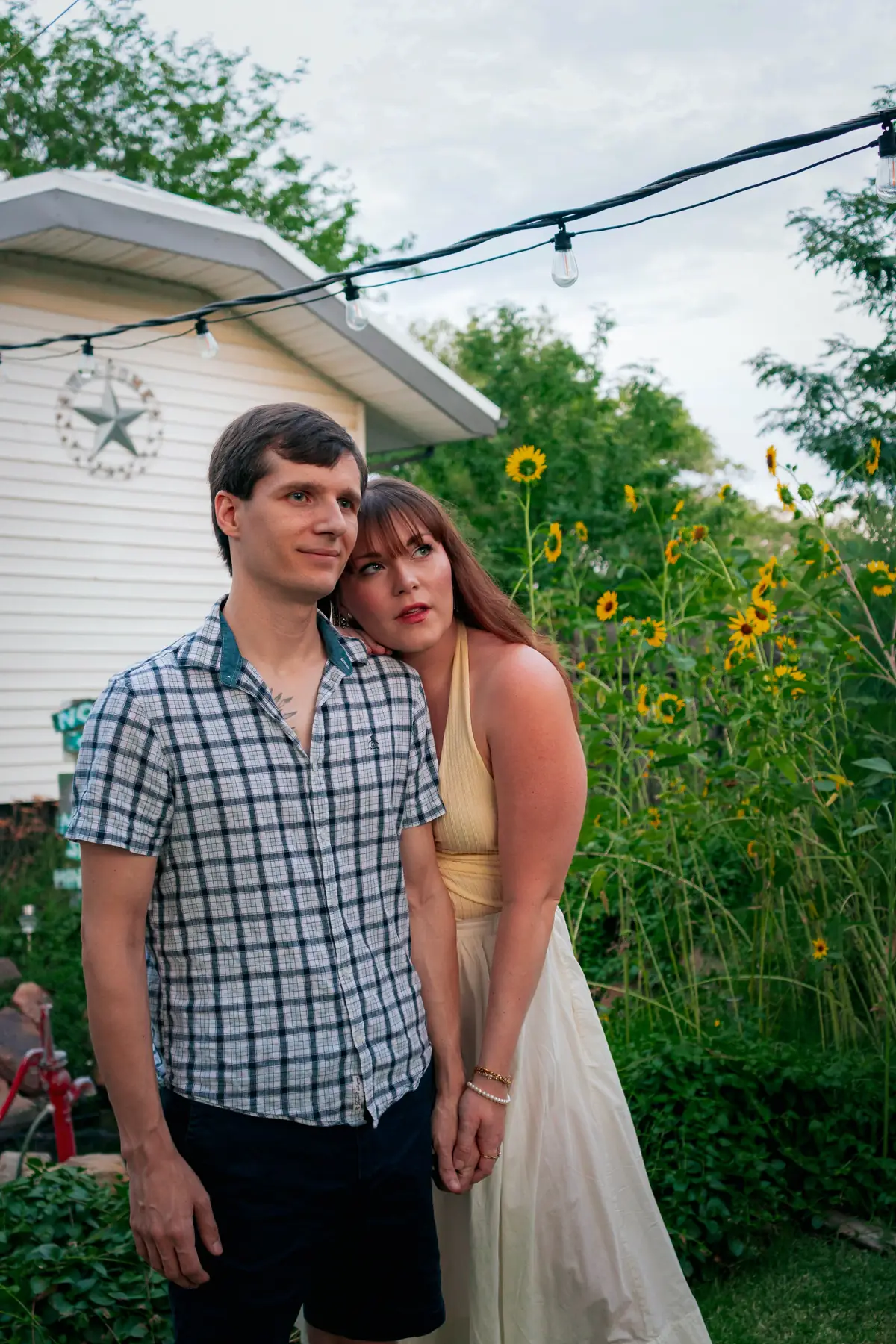 Illustrative stock photo of a couple in a garden, not real members